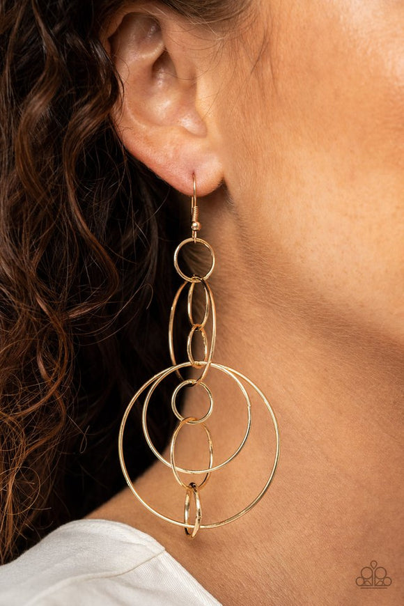 Paparazzi Running Circles Around You - Gold - Earrings  -  Small and medium sized gold links delicately alternate into an airy chain, while larger gold hoops haphazardly connect the chain into a dizzying lure. Earring attaches to a standard fishhook fitting.
