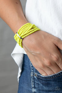 Paparazzi Thank Me LAYER - Yellow - Bracelet  -  Held together by a dainty silver fitting, a vibrant collection of Green Sheen beads are threaded along stretchy bands around the wrist, creating colorful layers.
