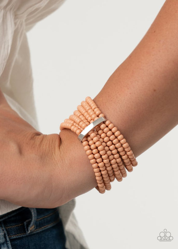 Paparazzi Thank Me LAYER - Orange - Bracelet  -  Held together by a dainty silver fitting, a shiny collection of Peach Nougat beads are threaded along stretchy bands around the wrist, creating colorful layers.
