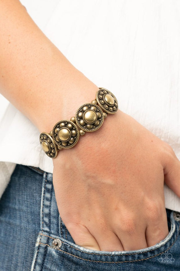 Paparazzi Rural Fields - Brass - Bracelet  -  Studded and dotted in decorative floral patterns, antiqued brass frames are threaded along stretchy bands around the wrist for a seasonal flair.
