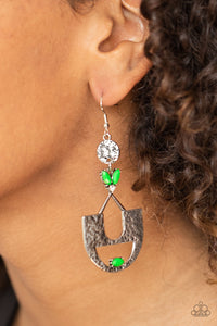 Paparazzi Modern Day Mecca - Green - Earrings  -  Featuring a glittery white rhinestone and faceted neon green beading, an abstract crescent frame attaches to a hammered silver disc, creating a colorfully rustic lure. Earring attaches to a standard fishhook fitting.
  

      



