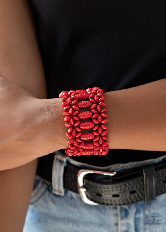 Paparazzi Fiji Flavor - Red - Bracelet  -  Painted in a fiery red finish, round and oval wooden beads are threaded along stretchy bands that weave into a colorful floral patterned stretch bracelet around the wrist.
