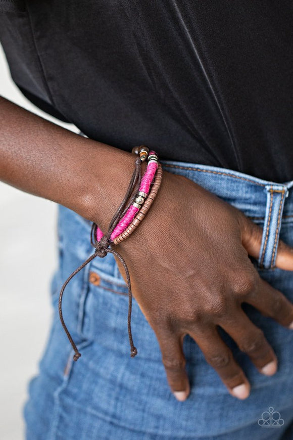 Paparazzi Totally Tiki - Pink - Bracelet  -  Infused with wooden and silver accents, mismatched strands of pink twine and brown cording layer around the wrist for a colorfully seasonal look. Features an adjustable sliding knot closure.
