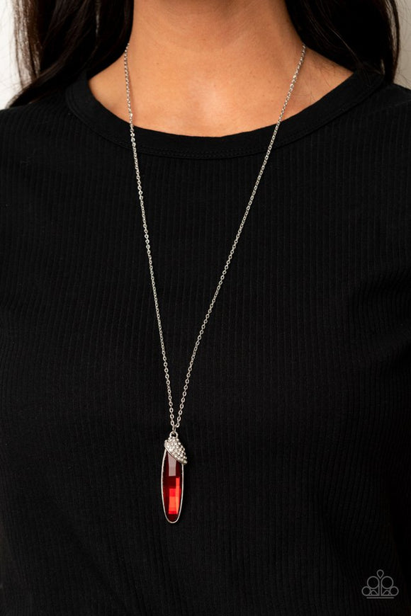 Paparazzi Spontaneous Sparkle - Red - Necklace  -  A white rhinestone encrusted silver fitting slants across the top of an oversized oval red rhinestone, creating a glamorous pendant at the bottom of a lengthened silver chain. Features an adjustable clasp closure.
