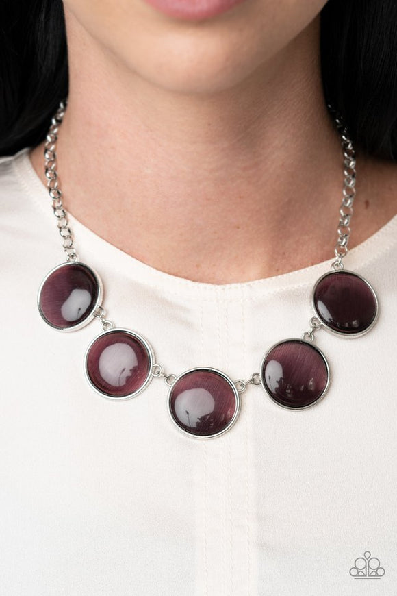 Paparazzi Ethereal Escape - Purple - Necklace  -  Featuring sleek silver fittings, a collection of round purple cat's eye stone pendants link below the collar for a colorfully ethereal look. Features an adjustable clasp closure.
