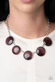 Paparazzi Ethereal Escape - Purple - Necklace  -  Featuring sleek silver fittings, a collection of round purple cat's eye stone pendants link below the collar for a colorfully ethereal look. Features an adjustable clasp closure.
