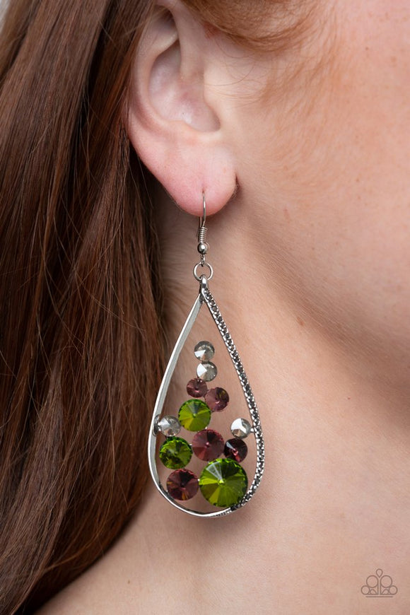 Paparazzi Tempest Twinkle - Multi - Earrings  -  An oversized collection of glittery purple, green, and smoky rhinestones collect inside a shimmery silver teardrop. One side of the frame is encrusted in dainty hematite rhinestones, adding an elegant edge to the glamorous lure. Earring attaches to a standard fishhook fitting.
