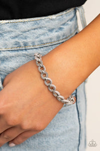 Paparazzi SUEDE Side to Side - Silver - Bracelet  -  Dainty strands of Sleet suede are delicately braided around and through a round silver chain for an edgy look. Features an adjustable clasp closure.
