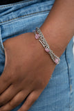 Paparazzi To Love and Adore - Pink - Bracelet  -  Infused with dainty silver bars, a charming collection of heart-shaped pink cat's eye stone beads delicately connect around the wrist alongside two silver chains of a whimsically layered look. Features an adjustable clasp closure.
