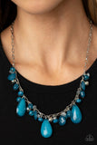 Paparazzi Seaside Solstice - Blue - Necklace  -  Featuring classic round and tranquil teardrop shapes, a glassy and opaque collection of blue, silver, and white beads swing from a shimmery silver chain below the collar, creating an enchanting fringe. Features an adjustable clasp closure.
