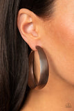 Paparazzi Desert Wanderings - Copper - Earrings  -  Lined in antiqued ridges, a thick copper hoop curls around the ear for an authentically rustic look. Earring attaches to a standard post fitting. Hoop measures approximately 2 ¼ inches in diameter.
