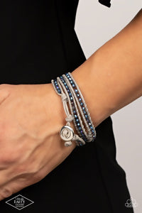 Paparazzi What Goes Around - Multi - Bracelet  -  A dainty collection of iridescent crystal-like beads are delicately threaded between two strands of shiny gray cording, coalescing into a trendy double-wrap bracelet around the wrist. Features an adjustable button loop closure.