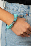 Paparazzi Eco Experience - Blue - Set  -  Infused with a pair of ornate silver beads, an earthy collection of shiny silver and refreshing turquoise discs alternate along a stretchy band around the wrist for an authentically artisan inspired look.
