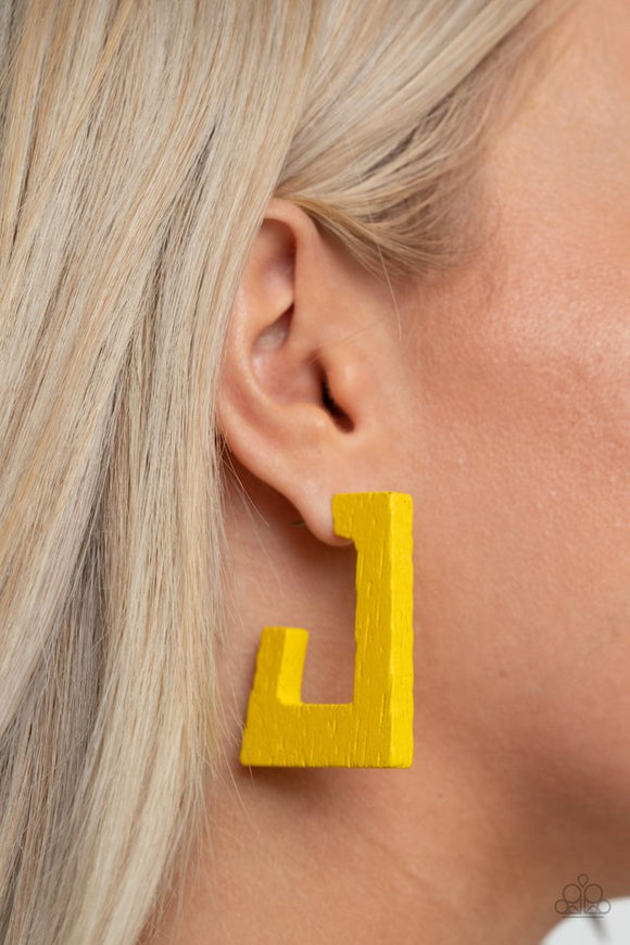 Paparazzi The Girl Next OUTDOOR - Yellow - Earrings  -  Painted in a sunny yellow finish, a distressed wooden frame curves around the ear, creating a rectangular hoop for a retro effect. Earring attaches to a standard post fitting. Hoop measures approximately 1