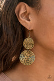 Paparazzi HARDWARE-Headed - Brass - Earrings  - January 2021 Fashion Fix Exclusive  -  Delicately hammered in rippling waves, a pair of textured brass discs link into a dramatic lure with industrial edge. Earring attaches to a standard fishhook fitting.

