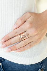 Paparazzi Voluptuous Vines - Rose Gold - Ring  -  Shiny rose gold filigree delicately vines across the finger, coalescing into an airy frame. Features a stretchy band for a flexible fit.
