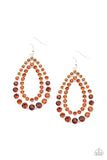 Paparazzi Glacial Glaze - Brown - Earrings  -  Varying in size, rows of glittery topaz rhinestones coalesce into two blinding teardrops for a jaw-dropping dazzle. 
