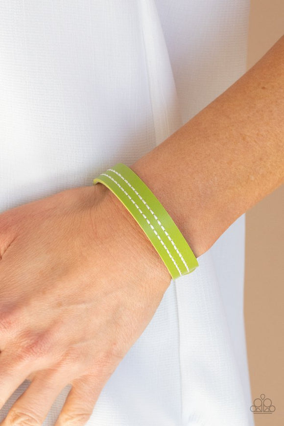 Paparazzi Life is WANDER-ful - Green - Bracelet  -  The front of a dainty green leather band is stitched in two linear rows, creating a colorfully rustic centerpiece around the wrist. 

