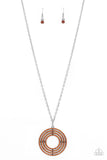 Paparazzi High-Value Target - Brown - Necklace  -  Dotted in dainty topaz rhinestones, shiny silver rings radiate out into a fabulously stacked pendant at the bottom of a lengthened silver chain. Features an adjustable clasp closure.
