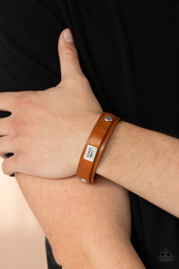 Paparazzi Dont Quit Now - Brown - Bracelet  -  A brown leather band featuring a rustic silver frame stamped in the phrase, 