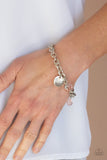 Paparazzi Lovable Luster - Pink - Bracelet  -  Pink crystal-like beads, a dainty white rhinestone, and a silver disc stamped in the word, "love," adorn a double-linked silver chain, creating a flirty fringe around the wrist. Features an adjustable clasp closure.
