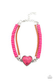 Paparazzi Charmingly Country - Pink - Set  -  A vivacious pink stone heart frame attaches to strands of brown suede and pink stone beads, creating a charming centerpiece around the wrist. Features an adjustable clasp closure.