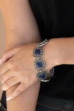 Paparazzi Dreamy Destinations - Blue - Bracelet  -  Dotted with blue cat's eye stones, square filigree filled silver frames delicately link around the wrist for a dreamy display. Features an adjustable clasp closure.
