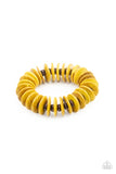 Paparazzi Caribbean Reefs - Yellow - Bracelet  -  Yellow wooden beads and distressed yellow wooden discs alternate along a stretchy band around the wrist, creating a colorful pop of summer flavor.
