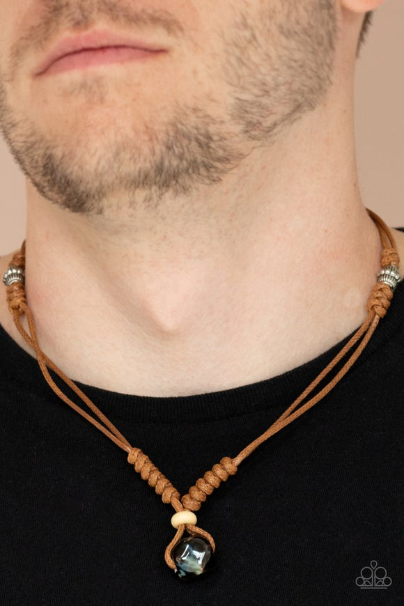 Paparazzi Might and MAINLAND - Brown - Necklace  -  An earthy wooden bead and glassy faceted accent are knotted in place at the bottom of shiny brown cording that wraps around the neck for an earthy inspiration. Features a button loop closure.
