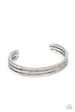 Paparazzi Armored Cable - Silver - Bracelet  -  Three shimmery rows of cable-like bars spin across the front of the wrist, coalescing into an edgy stacked cuff.
