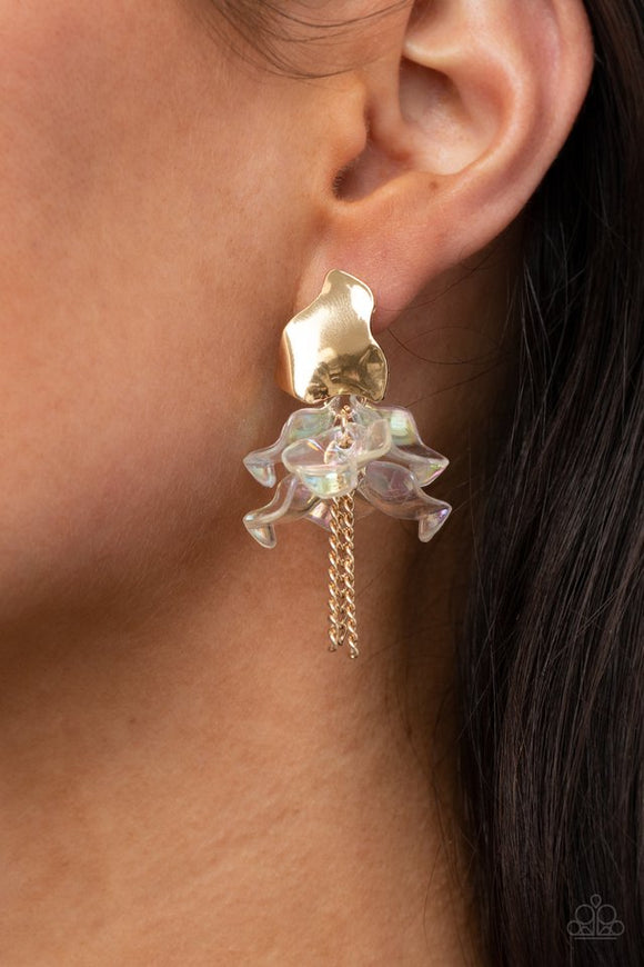 Paparazzi Harmonically Holographic - Gold - Earrings  -  Dainty gold chains stream out from the bottom of iridescent acrylic petal-like frames that attach to an asymmetrical gold frame, creating an enchanting cluster. Earring attaches to a standard post fitting.
