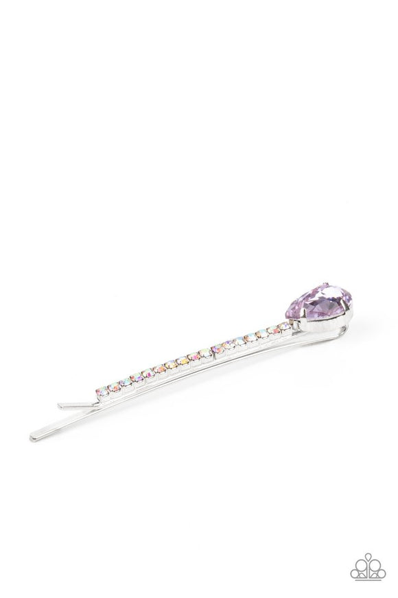 Paparazzi Princess Precision - Purple -   -  A purple teardrop gem adorns the corner of a bobby pin that is adorned in opalescent rhinestones for a glamorous finish.
