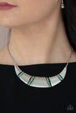 Paparazzi Going Through Phases - Multi - Necklace  -  Embossed in linear textures, trapezoidal and triangular silver plates delicately link with dainty iridescent metallic rhinestone encrusted frames, creating a dramatic half moon below the collar. Features an adjustable clasp closure.
