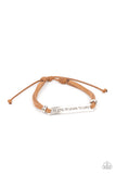 Paparazzi To Live, To Learn, To Love - Brown - Bracelet  -  Infused with pairs of silver rings, a silver plate stamped in the phrase, "To Live, To Learn, To Love," is knotted in place around the wrist by brown suede bands for an inspirational look. Features an adjustable sliding knot closure.
