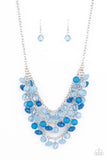 Paparazzi Fairytale Timelessness - Blue - Necklace  -  Varying in shape and opacity, a mismatched collection of blue and Cerulean crystal-like beads drip from the shimmery silver chains, creating an enchanted layered fringe below the collar. Features an adjustable clasp closure.
