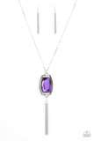 Paparazzi Timeless Talisman - Purple - Necklace  -  Encased in an antiqued silver frame, an oversized purple gem swings from the bottom of an ornate silver chain. A shimmery silver chain tassel swings from the bottom of the sparkly pendant, creating a regal talisman. Features an adjustable clasp closure.
