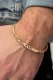Paparazzi Keep Calm and Believe - Gold - Necklace  -  Twisted gold bars attach to a shiny gold plate stamped in the word, "BELIEVE," creating an inspiring cuff around the wrist.
