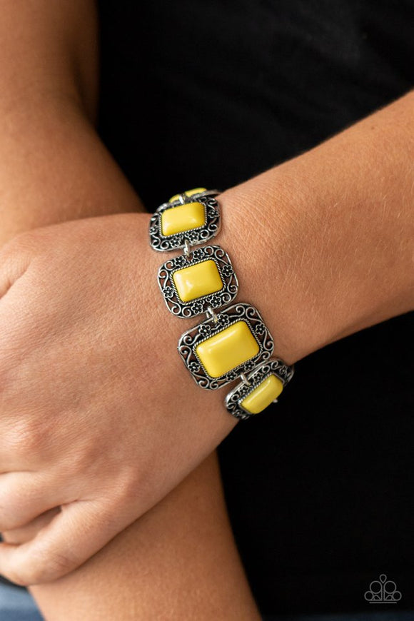 Paparazzi Retro Rodeo - Yellow - Bracelet  -  A flirty collection of Illuminating rectangular beads are bordered by rustic floral filigree filled frames as they delicately link around the wrist for a whimsical flair. Features an adjustable clasp closure.
