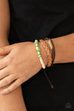Paparazzi Far Out Wayfair - Green - Bracelet  -  Mismatched strands of brown suede, braided brown leather, and green stones and white wooden beads layer across the wrist for a colorful seasonal look. Features an adjustable sliding knot closure.
