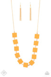 Paparazzi Hello, Material Girl - Orange - Necklace  - April 2021 Fashion Fix Exclusive  -  Vibrant geometric squares painted in the spring Pantone of Marigold flare out along a long gold chain as it drapes along the chest. Sleek gold cylinders separate the square plates, adding warm metallic accents to the piece. Features an adjustable clasp closure.
