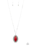 Paparazzi Exquisitely Enchanted - Red - Necklace  -  Dotted in glassy white rhinestones, leafy silver filigree blooms from an oversized red cat's eye stone, creating an enchanted pendant at the bottom of a lengthened silver chain. Features an adjustable clasp closure.

