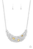 Paparazzi Fabulously Fragmented - Yellow - Necklace  -  Sporadically dotted in mismatched yellow and white rhinestones, a smattering of fragmented silver frames coalesce into a bold half moon below the collar for an edgy fashion. Features an adjustable clasp closure.
