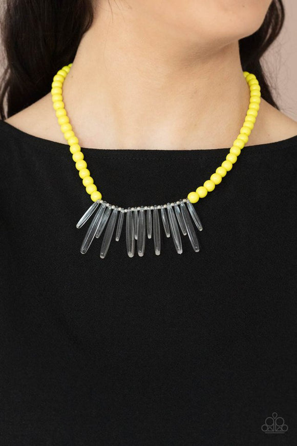 Paparazzi Icy Intimidation - Yellow - Necklace  -  Acrylic icicles drip from the center of a strand of yellow beads, creating an intensely icy fringe below the collar. Features an adjustable clasp closure.
