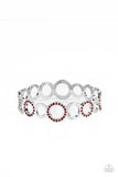 Paparazzi Future, Past, and POLISHED - Red - Bracelet  -  A glittery collection of fiery red rhinestone encrusted rings and shiny silver hoops coalesce into an airy bangle around the wrist.
