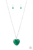 Paparazzi Warmhearted Glow - Green - Necklace  -  An oversized Mint cat's eye stone frame swings from the bottom of a lengthened silver chain, creating a flirtatious pendant. Features an adjustable clasp closure.

