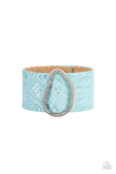 Paparazzi HISS-tory In The Making - Blue - Bracelet  -  Encrusted with glassy white rhinestones, an asymmetrical silver fitting glides along a blue leather band adorned in a metallic python print for a wild look. Features an adjustable snap closure.
