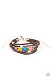Paparazzi Homespun Radiance - Multi - Bracelet  -  Infused with studded silver accents, a row of Desert Mist, Blue Tint, and Illuminating cat's eye stone beads adorn the centermost strand of layered leather bands around the wrist for a colorful seasonal look. Features an adjustable sliding knot closure.
