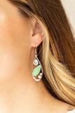 Paparazzi Harmonious Harbors - Green - Earrings  -  A silver teardrop frame embraces a collection of iridescent rhinestones and a milky Green Ash bead that is reminiscent of seashore finds. Earring attaches to a standard fishhook fitting.

