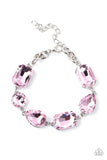 Paparazzi Cosmic Treasure Chest - Pink - Bracelet  -  A collection of oversized round, teardrop, and emerald cut pink rhinestones delicately link around the wrist, creating a blinding statement piece. Features an adjustable clasp closure.
