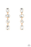 Paparazzi Cosmic Heiress - Gold - Earrings   -  A strand of oversized round, teardrop, and emerald cut white rhinestones trickles from the ear, creating a jaw-dropping golden chandelier. Earring attaches to a standard post earring.
 